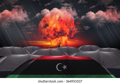 Protection Umbrella With Flag Of Libya On A Money War Background