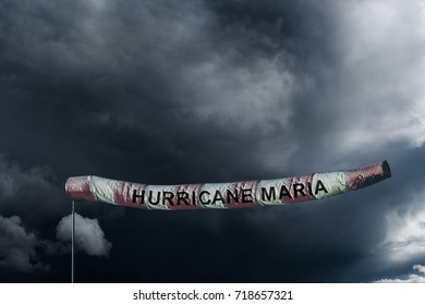 PUERTO RICO, CARIBBEAN, 20 September 2017 - Hurricane Maria has arrived! 
Digital image of extra long wind sock in a hurricane.
