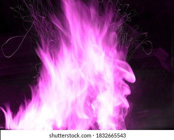 Purple fire and sparks emanating from it