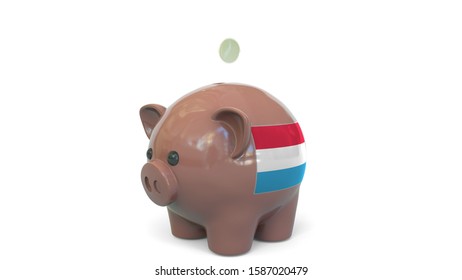 Putting Money Into Piggy Bank With Flag Of Luxembourg. Tax System System Or Savings Related Conceptual 3D Rendering