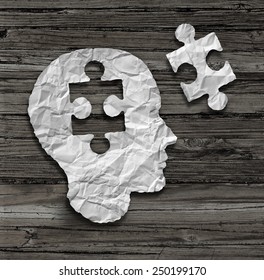 Puzzle Head Brain Concept As A Human Face Profile Made From Crumpled White Paper With A Jigsaw Piece Cut Out On A Rustic Old Wood Background As A Mental Health Symbol.