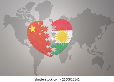 puzzle heart with the national flag of china and kurdistan on a world map background. Concept. 3D illustration