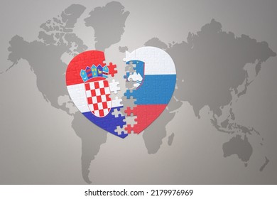 Puzzle Heart With The National Flag Of Croatia And Slovenia On A World Map Background.Concept. 3D Illustration