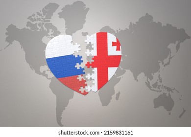 Puzzle Heart With The National Flag Of Russia And Georgia On A World Map Background. Concept. 3D Illustration