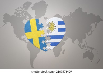puzzle heart with the national flag of sweden and uruguay on a world map background. Concept. 3D illustration