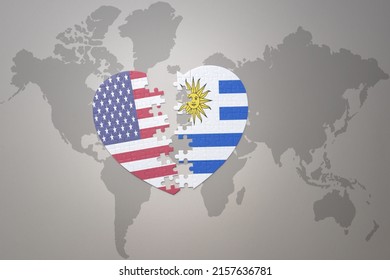 puzzle heart with the national flag of united states of america and uruguay on a world map background. Concept. 3D illustration