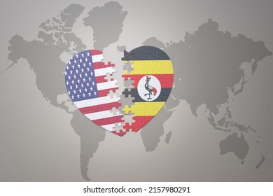 puzzle heart with the national flag of united states of america and uganda on a world map background. Concept. 3D illustration
