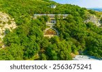 Pyatigorsk, Russia. Watercolor illustration. A flower bed with a staircase and the Academic Gallery is an elegant building from the mid-19th century. Aerial view