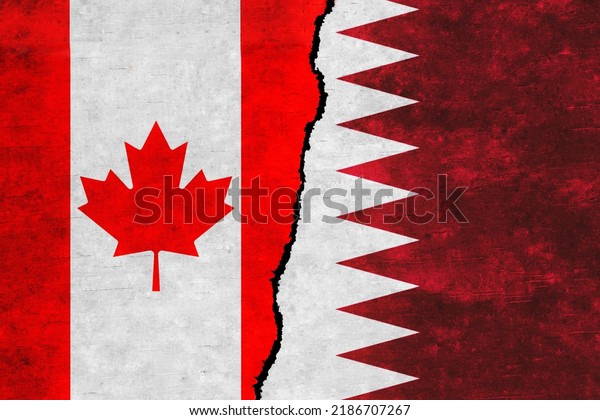 Qatar and\
Canada painted flags on a wall with a crack. Qatar and Canada\
relations. Canada and Qatar flags\
together