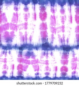 Quality genuine tie dye repeat pattern in muted hues of pink and indigo blue. Seamless repeating pattern. 
