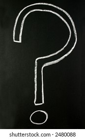 A Questionmark on a chalkboard.