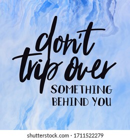 Quote On Blue Background - Don't Trip Over Something Behind You