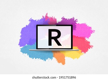 R Programming Language. Letter R On Laptop