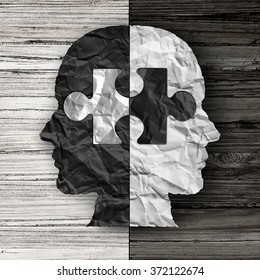 Racial Ethnic Social Issue And Equality Concept Or Cultural Justice Symbol As A Black And White Crumpled Paper Shaped As A Human Head On Wood With A Puzzle Piece As A Metaphor For Social Race Issues.