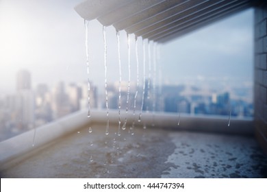 Rain pouring off roof on city background. 3D Rendering