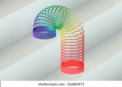 Rainbow colored plastic Slinky toy
