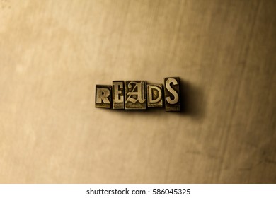 READS - Close-up Of Grungy Vintage Typeset Word On Metal Backdrop. Royalty Free Stock Illustration.  Can Be Used For Online Banner Ads And Direct Mail.