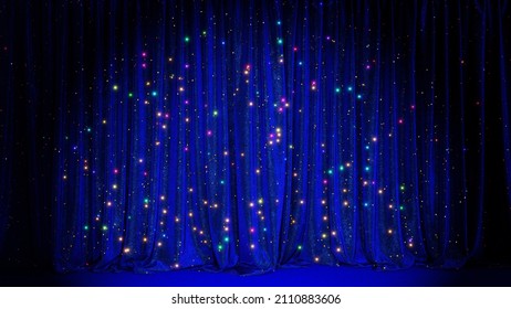 Realistic 3D Illustration Of The Luxurious And Fancy Dark Blue Velvet Colorful Glittering Lights Stage Curtain With Carpet Floor Rendered As Background