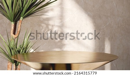 Realistic 3D render close up blank space on modern stylish golden round podium with dracaena tropical plants and marble beige wall in background, Morning sunlight. Beauty and fashion products display.