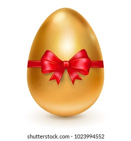 Realistic golden Easter egg tied of red ribbon with a big bow on white background