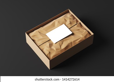 Realistic Open Cardboard Box With White Wrapping Paper And A Business Card On A Black Background. Side View. Mock Up. 3d Rendering