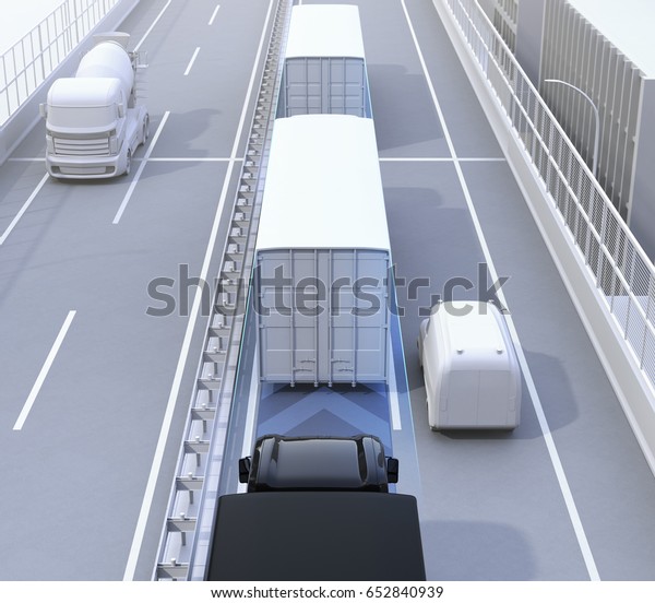 Rear view of autonomous truck fleet driving on
highway. 3D rendering
image.