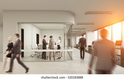 Rear View Of Three People Communicating In Glass Meeting Room In Busy Office. 3d Rendering. Mock Up. Toned Image