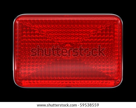 Red button or headlight isolated over black