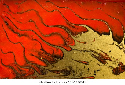 Red And Gold Marbling Pattern. Golden Marble Liquid Texture.