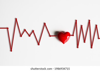 Red Hart With Ecg Graph, Symbol Of Puls, Heart Beat, Or Health. Isotalted In White Background, 3d Illustration