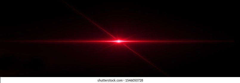 Red lens flare light on black background
