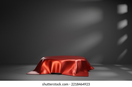 Red Silk Cover Product Stage In Dark Room With Shadow Overlay. Simple Mockup Background For Advertising. Glossy Satin Reveal Gift. Empty Dark Wall View.