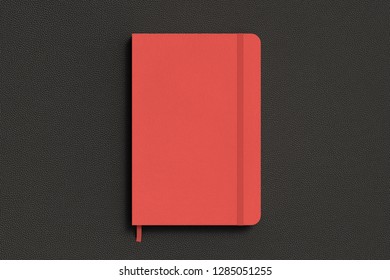 Red vertical notebook with elastic band on black background. 3d illustration