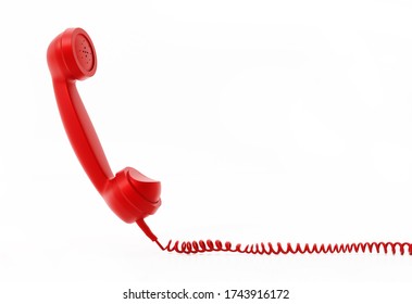 Red Vintage Phone Receiver And Wire Isolated On White Background. 3D Illustration.