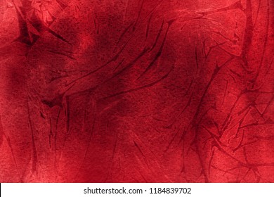 Red watercolor ombre leaks and splashes texture on white watercolor paper background. Autumn season hand painted image.