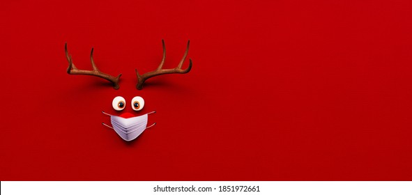 Reindeer Toy With Cold Red Nose And Medical Mask On Red Christmas Corona Background 3D Rendering, 3D Illustration