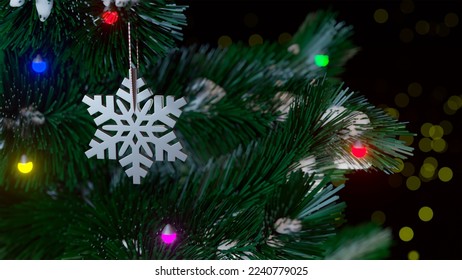 Render of a Christmas tree with lanterns and a snowflake. Year of the rabbit according to the Chinese calendar. Chinese New Year. Silver snowflacke on the tree. Background for Christmas and New Year.