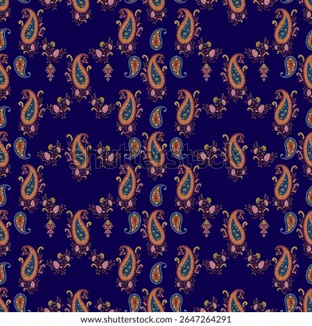 A repeating paisley pattern on a dark blue background, with floral accents, creates a vintage and ornate textile design element.