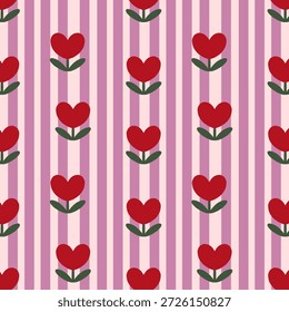 Repeating pattern of red hearts and green leaves on pink and white striped background, creating a whimsical and playful design.