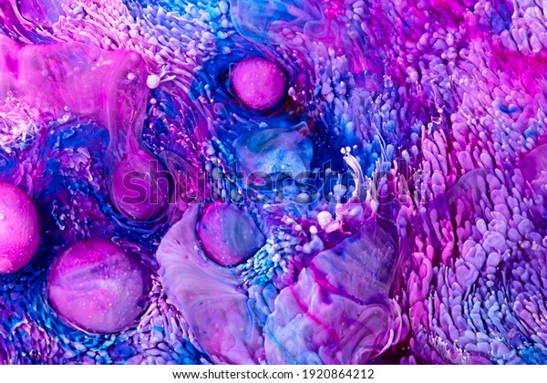 Resin art texture with blue, lilac and white\
colors. Fluid backdrop with splashes and ripples. Abstract frozen\
artwork with alcohol inks. Bright pigments mixes on\
macrophotography\
wallpaper.