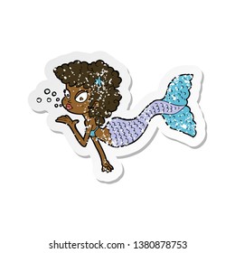 retro distressed sticker cartoon mermaid blowing kiss