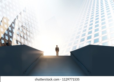 road to success concept with businessman climbs up the stairs among business buildings in the city