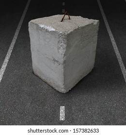 Roadblock Obstacle And Barrier Business Concept As A Huge Cement Or Concrete Cube Barricade Blocking A Road As A Symbol Of Restricted Opportunity Or Political Gridlock Or Financial System Shutdown.