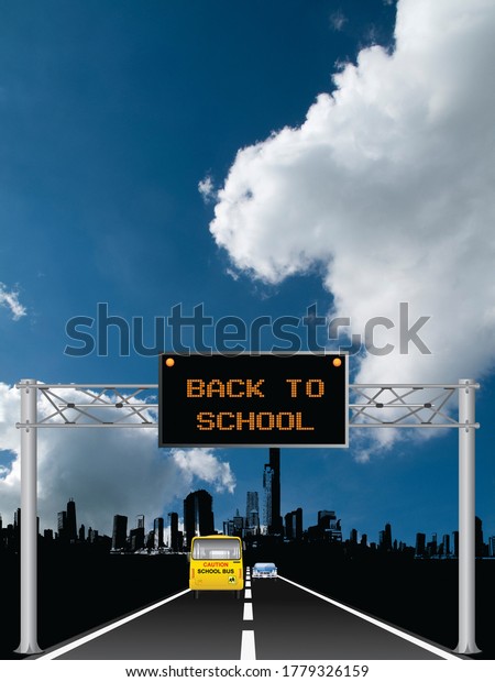 Roadway overhead digital\
gantry sign with back to school message set against a blue cloudy\
sky 