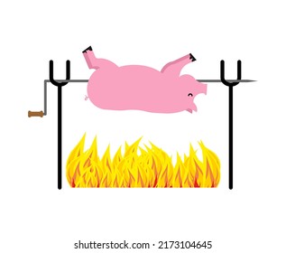 Roasted Pig on spit. Pork on fire.  
