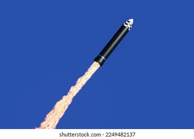 Rocket missile with a long jet of fire propulsion is being launched into the blue sky. 3D illustration of the concept of development of satellites or nuclear warheads
