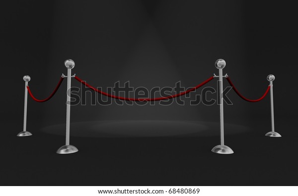 Rope barrier in\
a dark scene with scene\
lights