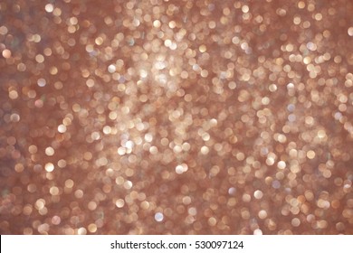 Rose Gold Abstract Bokeh Glitter Background