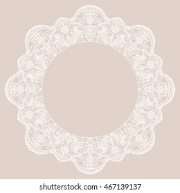 Round lace frame on beige background. Template for wedding or greeting card