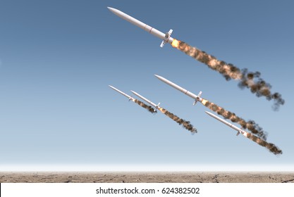 A row of intercontinental ballistic missiles launching in a desert on a blue sky background - 3D render